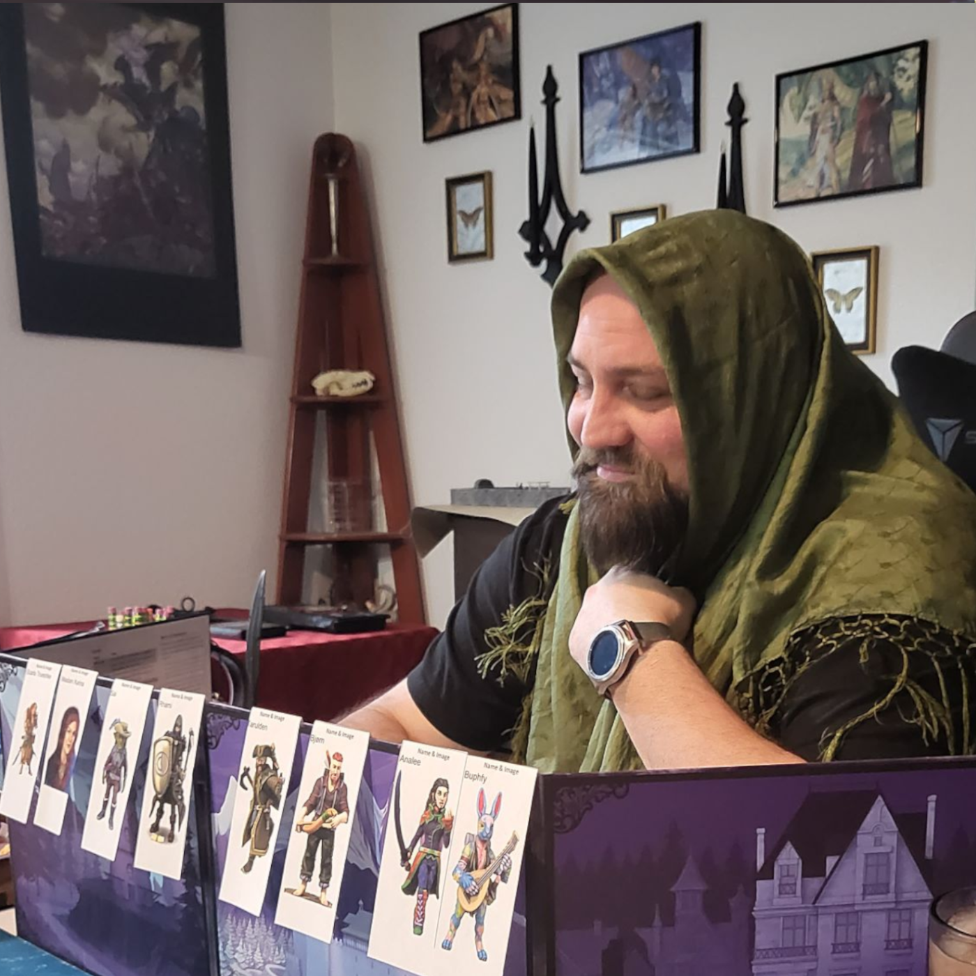 DM giving a Tarokka reading as Madam Karina during the first session of Mists of Ravenloft, a Curse of Strahd campaign being run in person at the admin's home.